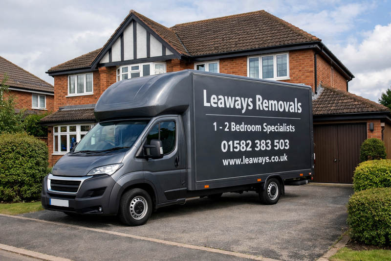 Leaways Removals van outside a home