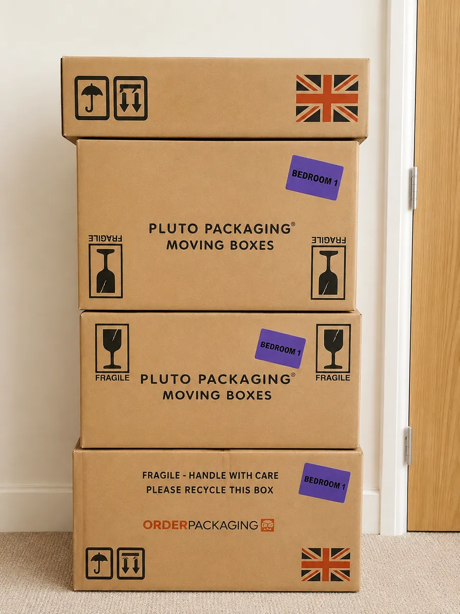Bedroom boxes packed and tagged with room stickers by the Leaways Removals crew