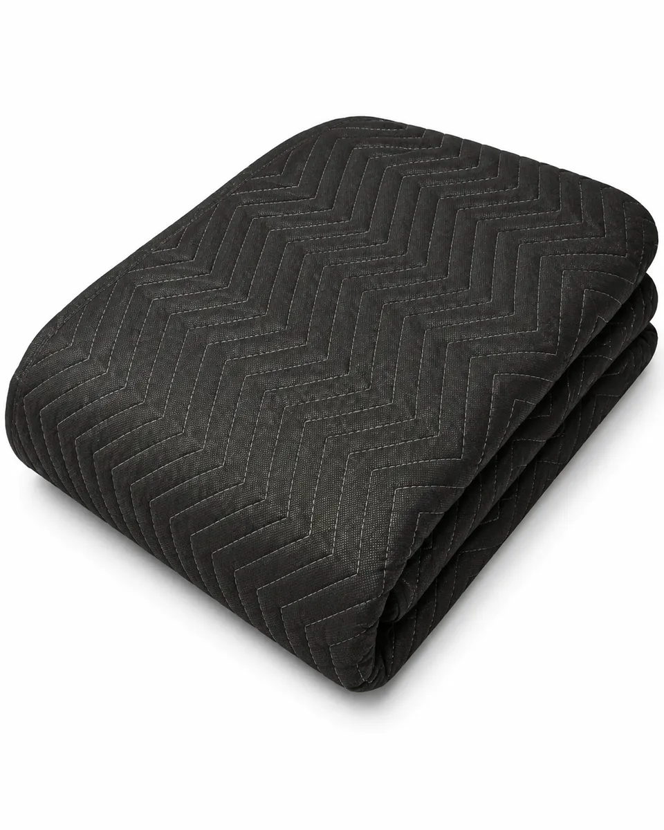 Quilted padded moving blankets used by Leaways Removals to wrap and protect furniture